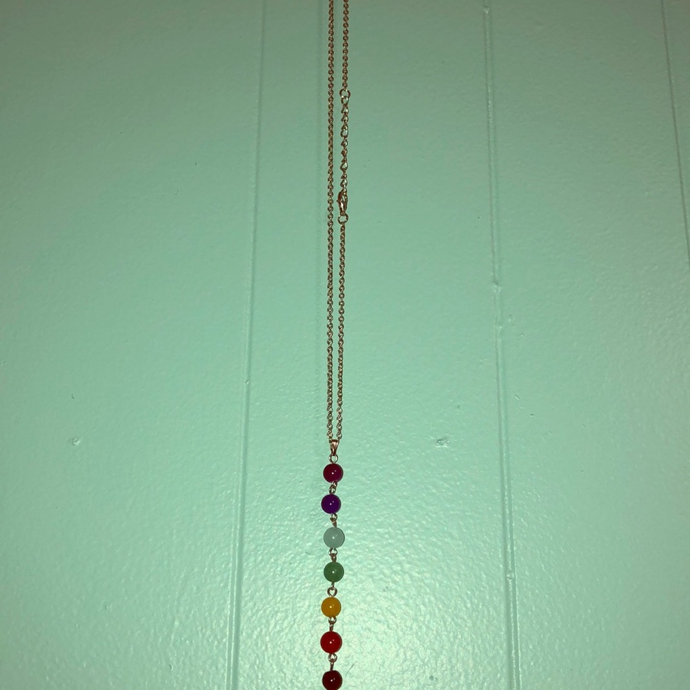 Necklace with seven beads on a silver chain